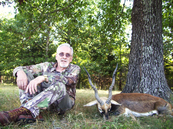 250 lb. hog was taken with a rifle.